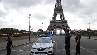 Bomb scare at Eiffel Tower: Paris police briefly evacuate monument, barricade surrounding area