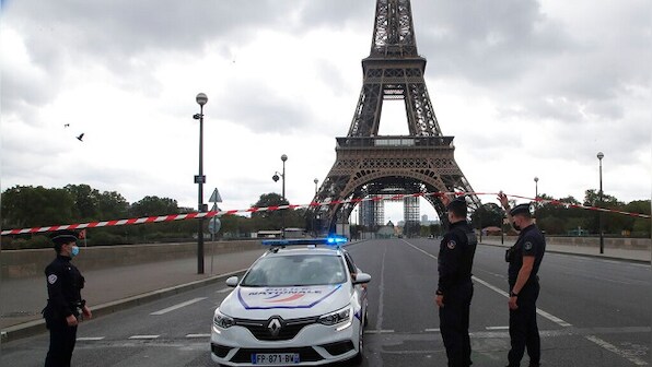 Bomb scare at Eiffel Tower: Paris police briefly evacuate monument, barricade surrounding area