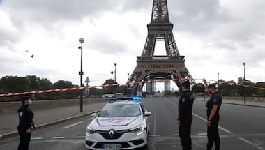 Bomb scare at Eiffel Tower: Paris police briefly evacuate monument, barricade surrounding area