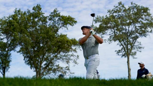 US’ Bryson DeChambeau plays his shot from the fourth tee during the final round of the US Open Golf Championship. Image courtesy: AP
