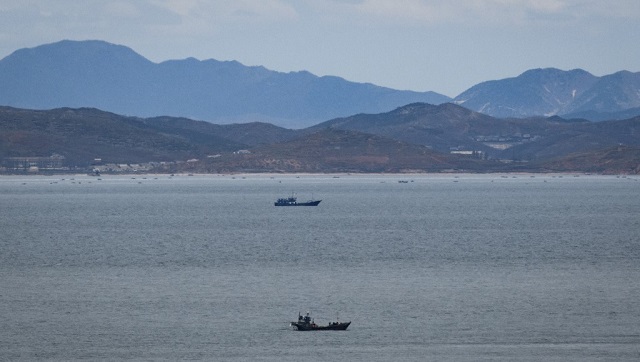 North Korean soldiers killed 'defector' from South and burnt his body, claims Seoul North Korean soldiers killed 'defector' from South and burnt his body, claims Seoul