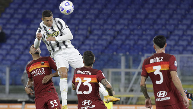 Serie A: Cristiano Ronaldo double rescues a point for Juventus at Roma; Napoli hammer Genoa Serie A: Cristiano Ronaldo double rescues a point for Juventus at Roma; Napoli hammer Genoa