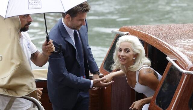 Singer and actress Lady Gaga, right, and actor Bradley Cooper arrive at the Venice Film Festival for the photo call of the film ‘A Star Is Born’. The 77th Venice Film Festival will kick off on Wednesday, 2 September, but this year’s edition will be unlike any others. Coronavirus restrictions will mean fewer Hollywood stars, no crowds interacting with actors and other virus safeguards will be deployed. (AP Photo/Kirsty Wigglesworth, File)