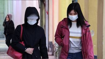 A new theory asks whether wearing a mask can be a crude COVID-19 ‘vaccine’