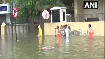 Mumbai rains: Heavy downpour leaves parts of city waterlogged; road and rail traffic disrupted