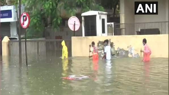 Mumbai rains: Heavy downpour leaves parts of city waterlogged; road and rail traffic disrupted