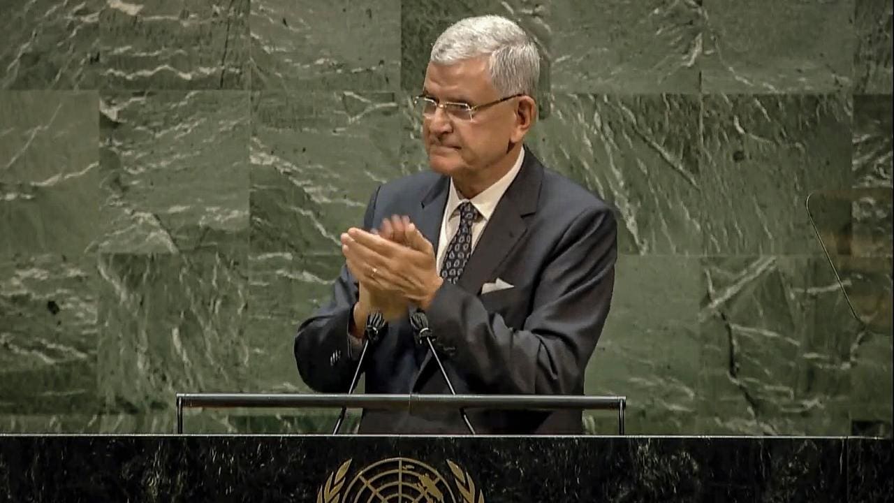 In this UNTV image, Volkan Bozkir, President of the 75th session of the United Nations General Assembly, applaud as he delivers closing remarks, Tuesday, Sept. 29, 2020, at UN headquarters in New York. (UNTV via AP)