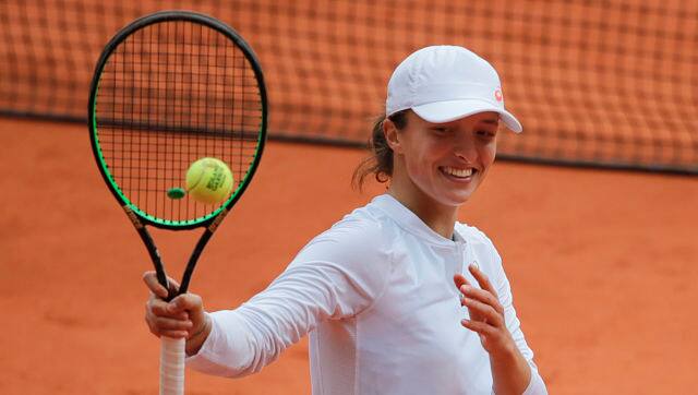Iga Swiatek celebrates after winning her semifinal match against Argentina's Nadia Podoroska in two sets, 6-2, 6-1. AP