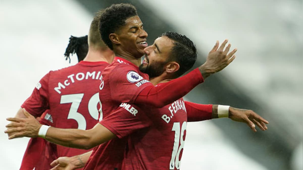 Premier League: Manchester United score late goals to beat Newcastle; Man City overcome Arsenal