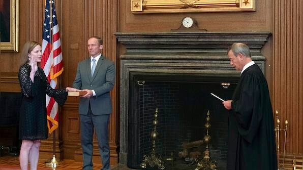 Amy Barrett sworn in as US Supreme Court's ninth justice as issues important to Trump await