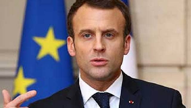French president Emmanuel Macron slapped while greeting crowd during visit to town; two detained