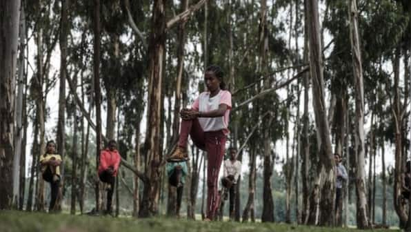 Ethiopia's 'town of runners' strives to outpace coronavirus as excitement for Bekele-Kipchoge showdown bubbles over