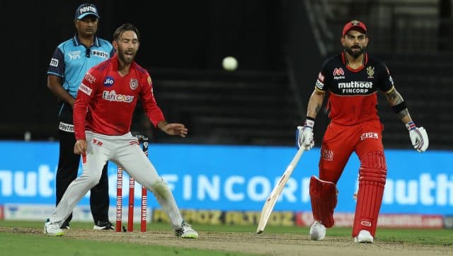 RCB won the toss and opted to bat with Glenn Maxwell opening the bowling for KXIP. The Australian didn't get any wicket but gave away just 28 runs in his four overs. Image: Sportzpics for BCCI