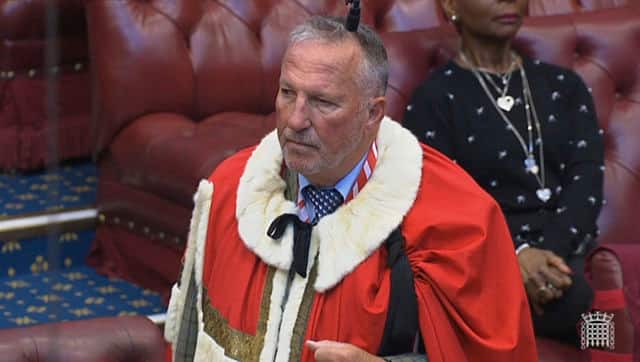 England cricket legend Ian Botham takes his seat in the House of Lords as Baron Botham of Ravensworth on Monday. Image courtesy: House of Lords via AP Photo