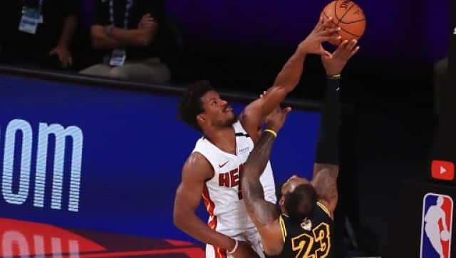 Lakers’ LeBron James (right) is blocked by Jimmy Butler of the Miami Heat. AFP