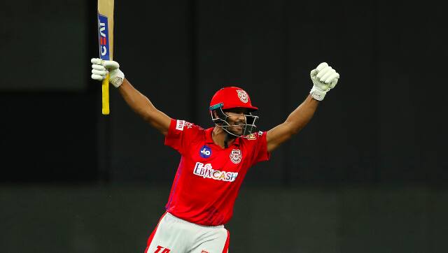 Mayank Agarwal celebrates after hitting the winning shot for KXIP in the second Super Over of the match against MI. Sportzpics