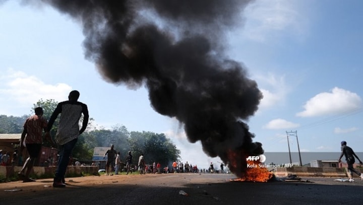 Nigeria declares 24-hour curfew in Lagos as violence flares during protests