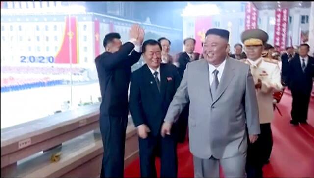 North Korean leader Kim Jong-un (centre) smiles as he leaves a ceremony to celebrate the 75th anniversary of the country’s ruling party in Pyongyang. AP