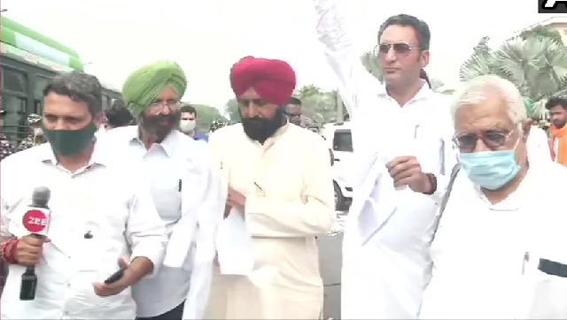 Irked by Union agriculture minister's absence, Punjab farmers leave Delhi meeting, tear copies of farm laws Irked by Union agriculture minister's absence, Punjab farmers leave Delhi meeting, tear copies of farm laws