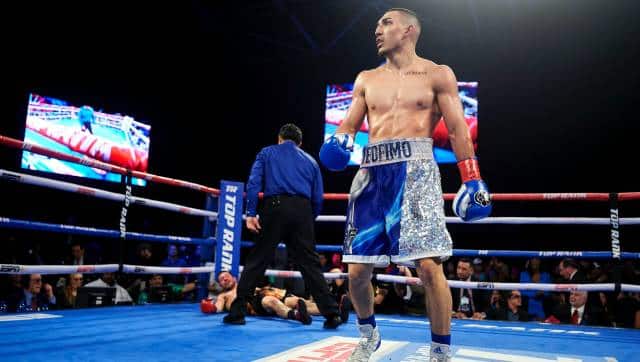 Teofimo Lopez celebrates after defeating Diego Magdaleno during a NABF, NABA and USBA lightweight title boxing match, Saturday, Feb. 2, 2019, in Frisco, Texas. (AP Photo/Cooper Neill)