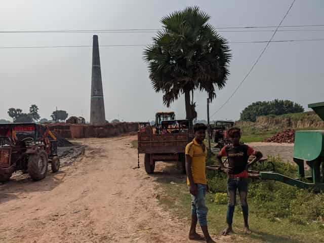  Children wait outside a brick kiln in Nawada's Dularpur village. Firstpost/Devparna Acharya