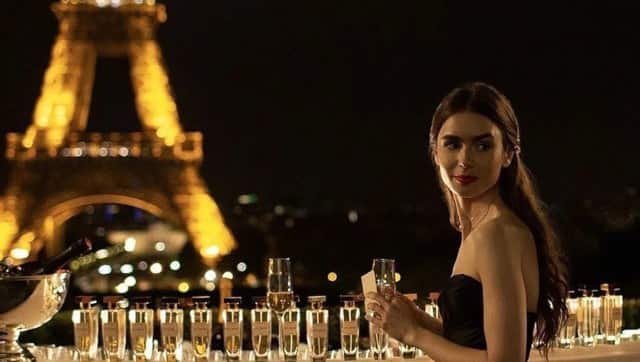 Lily Collins as Emily Cooper
