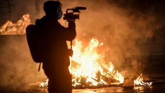 Protests in Italy against curbs due to COVID-19 turn violent; smoke bombs hurled at police