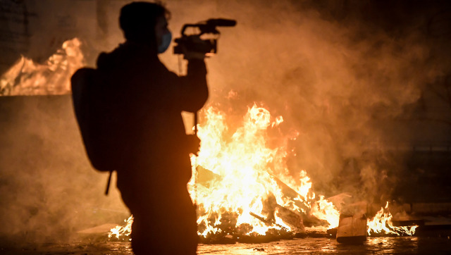 Protests in Italy against curbs due to COVID-19 turn violent; smoke bombs hurled at police Protests in Italy against curbs due to COVID-19 turn violent; smoke bombs hurled at police