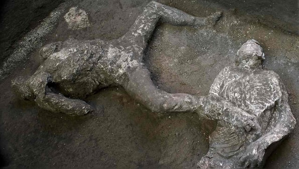 Archeologist uncover skeletal remains of two men escaping from Mount Vesuvius's eruption in Pompeii