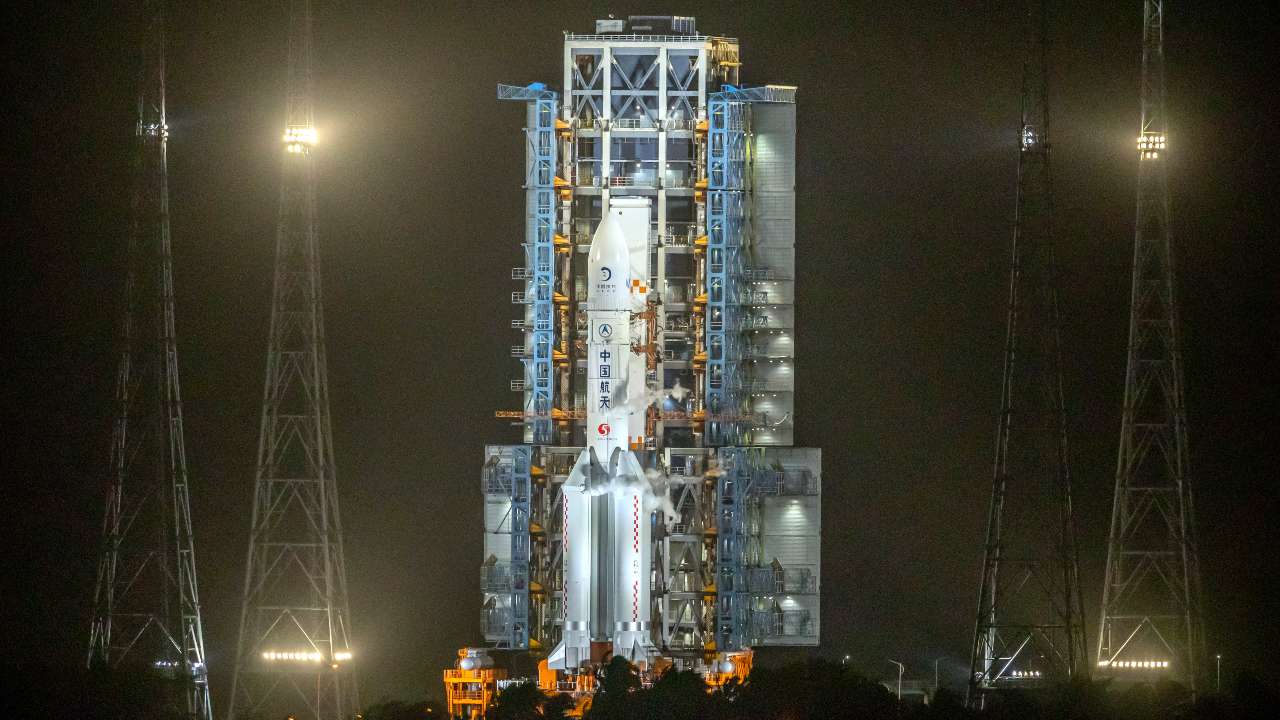 A Long March-5 rocket sits on the launch pad at the Wenchang Space Launch Center in Wenchang in southern China's Hainan Province, early Tuesday, Nov. 24, 2020. Chinese technicians are making final preparations for a mission to bring back material from the moon's surface for the first time in more than four decades, an undertaking that could boost human understanding of the moon and of the solar system more generally. (AP Photo/Mark Schiefelbein)