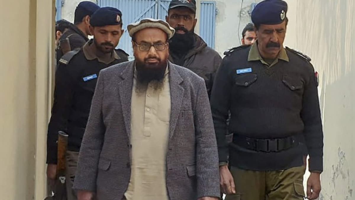 Pakistani anti-terrorism court sentences 26/11 mastermind Hafiz Saeed to 10 years in jail in two terror cases