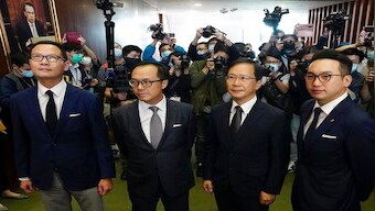 Hong Kong's lawmakers resign en masse after China ousts four pro-democracy legislators