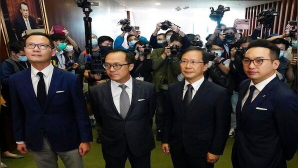 Hong Kong's lawmakers resign en masse after China ousts four pro-democracy legislators