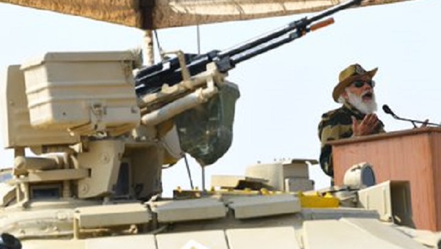 Narendra Modi celebrates Diwali with soldiers at Longewala Post; sends stern message to China Narendra Modi celebrates Diwali with soldiers at Longewala Post; sends stern message to China