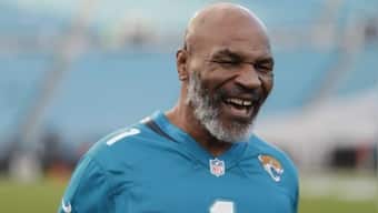 Mike Tyson says 'kid inside him' is under control as he prepares for Roy Jones Jr bout