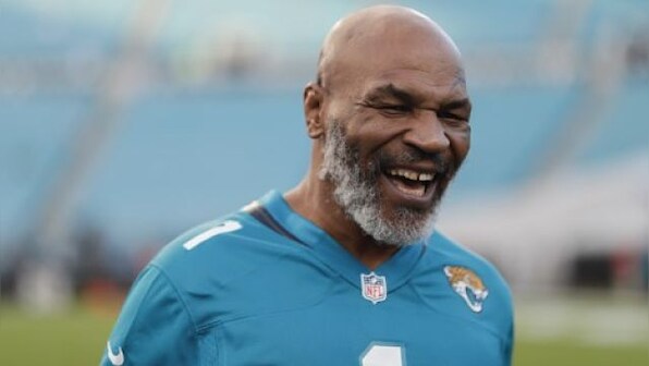 Mike Tyson says 'kid inside him' is under control as he prepares for Roy Jones Jr bout
