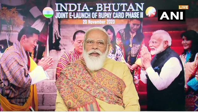Narendra Modi and Bhutan PM Lotay Tshering jointly launch RuPay card Phase 2 Narendra Modi and Bhutan PM Lotay Tshering jointly launch RuPay card Phase 2