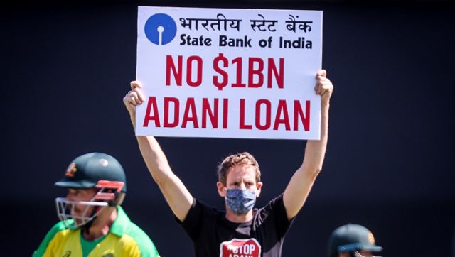 India vs Australia: Two protesters enter field holding 'No $1B Adani Loan' signs during 1st ODI in Sydney India vs Australia: Two protesters enter field holding 'No $1B Adani Loan' signs during 1st ODI in Sydney