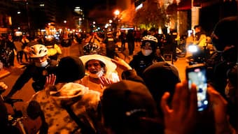 MAGA March in Washington: Donald Trump supporters clash with counter-protesters as night falls