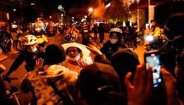 MAGA March in Washington: Donald Trump supporters clash with counter-protesters as night falls