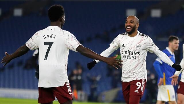Arsenal’s Alexandre Lacazette celebrates after scoring his side’s first goal during the English Premier League match between Brighton and Arsenal. AP 