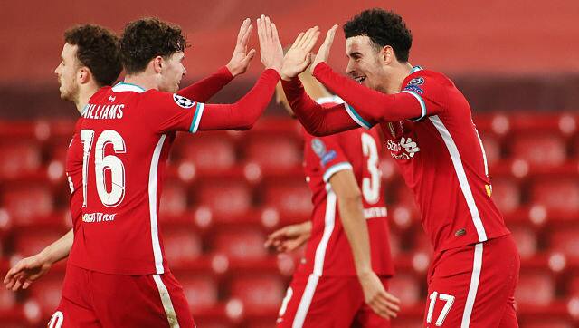 Liverpool's Neco Williams celebrates with teammate Curtis Jones. AP