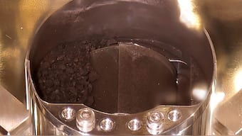 First peek inside Hayabusa2 capsule; JAXA officials find more than anticipated asteroid sand, gas inside
