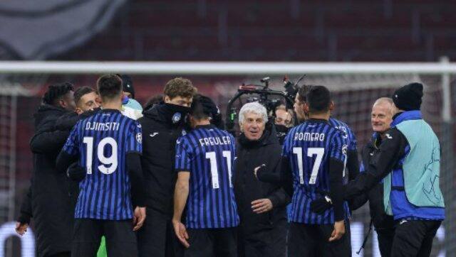 Atalanta players celebrate after reaching the last 16. AFP