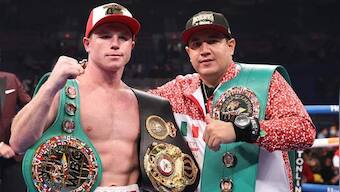 Mexico's Canelo Alvarez overpowers British boxer Callum Smith to claim two world super middleweight titles