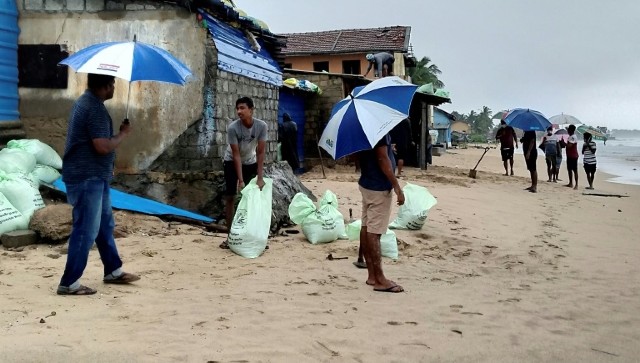Cyclone Burevi moves away from Sri Lanka after minimum damage, say weather department officials Cyclone Burevi moves away from Sri Lanka after minimum damage, say weather department officials