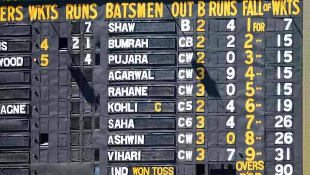 The scoreboard shows the fall of India's wickets near the end of their second innings against Australia on the third day of their cricket test match at the Adelaide Oval in Adelaide, Australia, Saturday, Dec. 19, 2020. (AP Photo/David Mairuz)