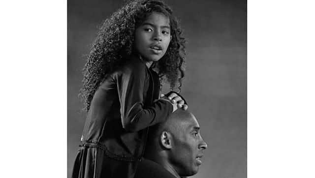 File photo from 2014 shows Gianna Maria-Onore Bryant on the shoulders of her father, Kobe, as they attend the women’s football match between the United States and China in San Diego. AP Photo