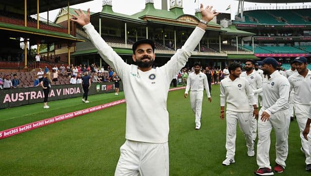 India’s captain Virat Kohli (L) gestures as India team celebrates their series win on the fifth day of the fourth and final cricket Test against Australia at the Sydney Cricket Ground in Sydney on January 7, 2019. AFP 