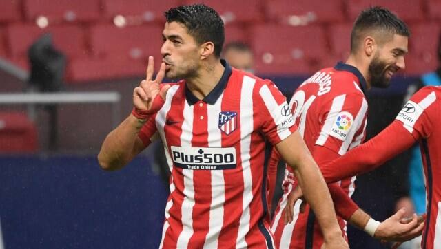 Luiz Suarez celebrates after scoring against Elche. AFP